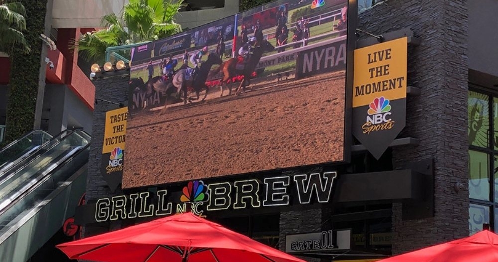 A restaurant displays their name on the front of their building using the Performance Series LED display from Nanolumens.